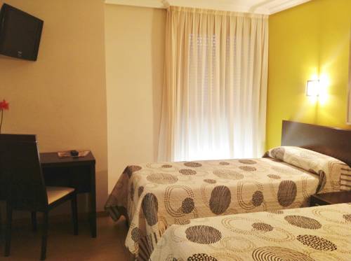 Imagen de la habitación del Hostal El Lechuguero. Foto 10