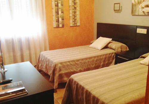 Imagen de la habitación del Hostal El Lechuguero. Foto 11