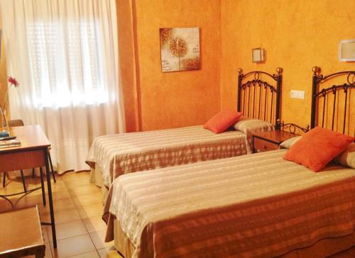 Imagen de la habitación del Hostal El Lechuguero. Foto 12