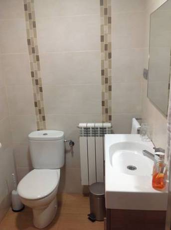 Imagen de la habitación del Hostal El Lechuguero. Foto 14