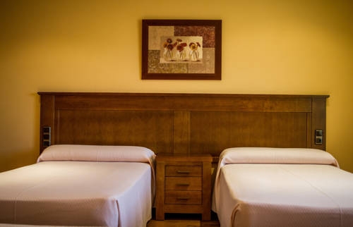 Imagen de la habitación del Hostal El Nacimiento. Foto 7