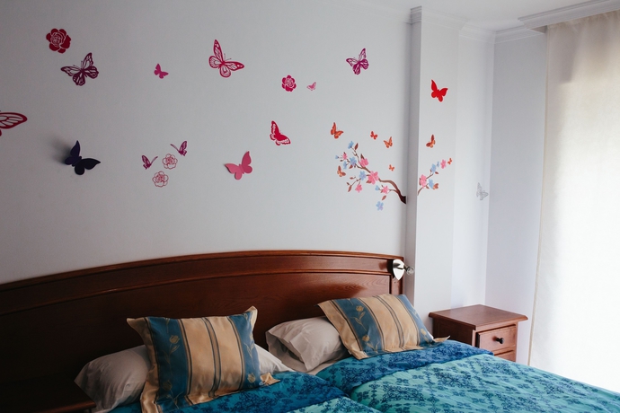 Imagen de la habitación del Hostal El Puerto, Caleta De Vélez. Foto 5