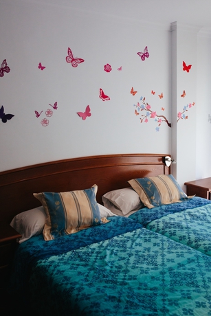 Imagen de la habitación del Hostal El Puerto, Caleta De Vélez. Foto 10