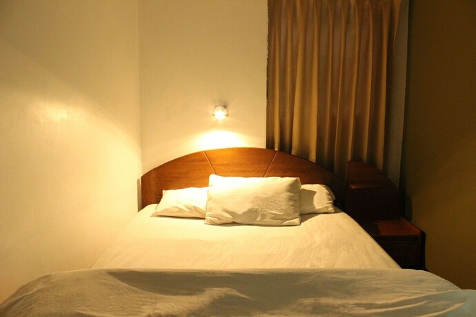 Imagen de la habitación del Hostal El Puma, Santiago. Foto 22