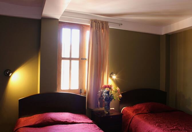 Imagen de la habitación del Hostal El Puma, Santiago. Foto 23