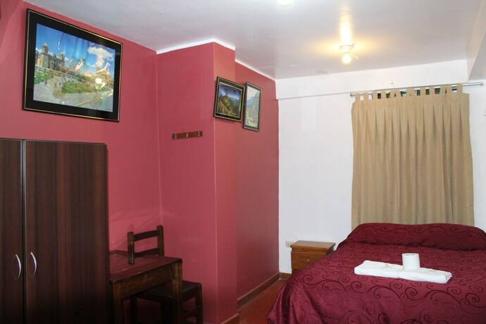 Imagen de la habitación del Hostal El Puma, Santiago. Foto 24