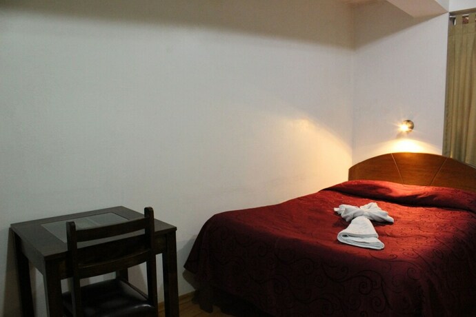 Imagen de la habitación del Hostal El Puma, Santiago. Foto 26