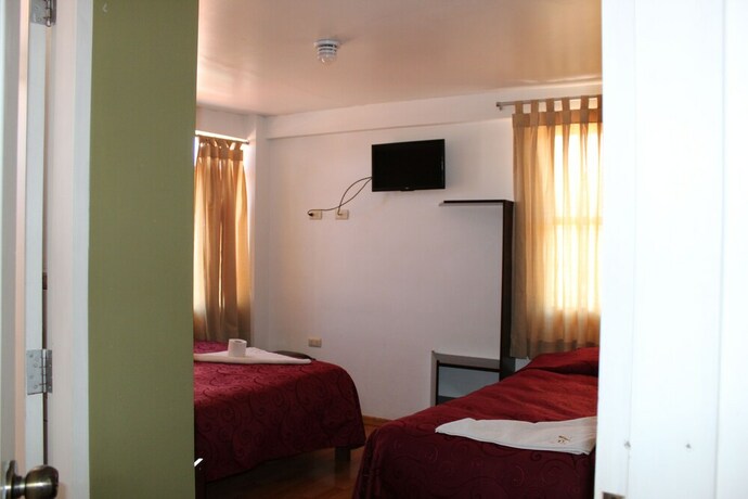 Imagen de la habitación del Hostal El Puma, Santiago. Foto 30