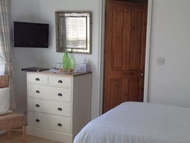 Imagen de la habitación del Hostal Endeavour House. Foto 7
