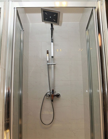 Imagen de la habitación del Hostal Exhibition Court Hotel 4. Foto 2