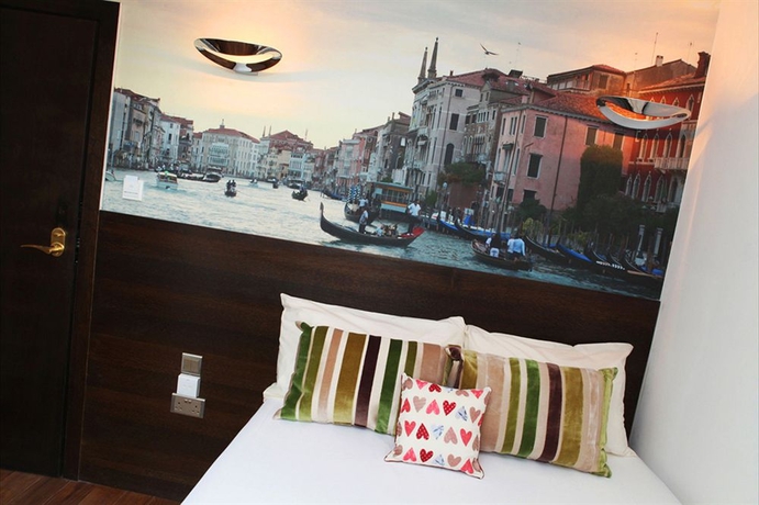 Imagen de la habitación del Hostal Exhibition Court Hotel 4. Foto 4