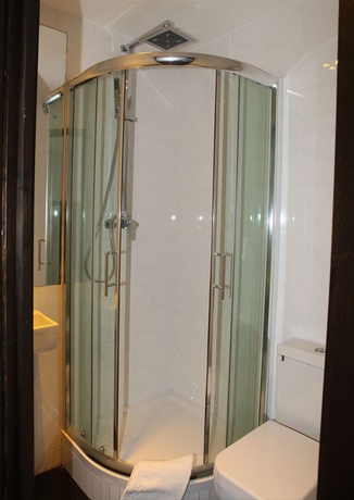 Imagen de la habitación del Hostal Exhibition Court Hotel 4. Foto 5