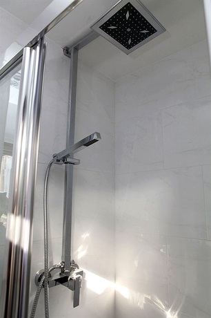 Imagen de la habitación del Hostal Exhibition Court Hotel 4. Foto 7