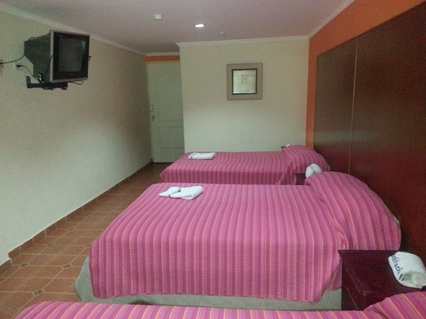 Imagen de la habitación del Hostal Express Inn Panama International Airport. Foto 11