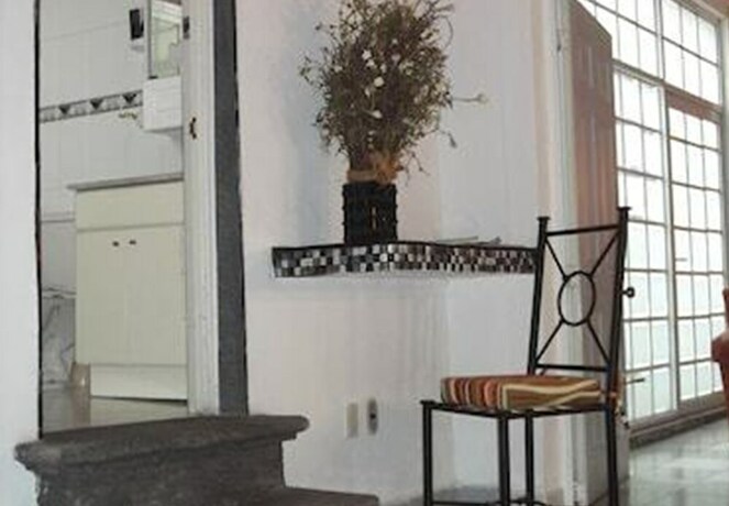 Imagen de la habitación del Hostal Galerie, Santiago de Queretaro. Foto 11