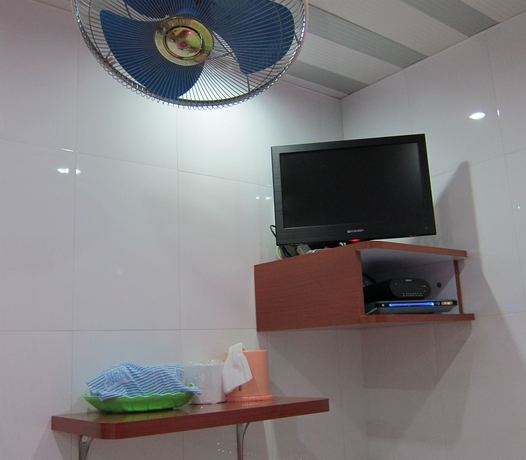 Imagen de la habitación del Hostal Guangdong Guest House. Foto 2