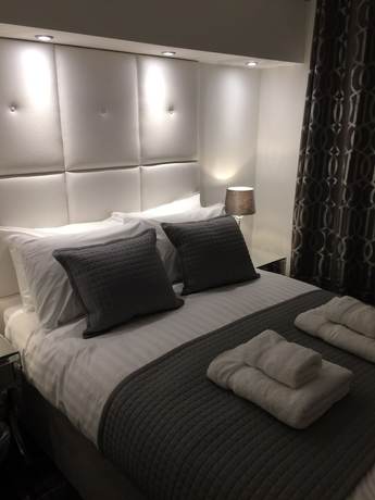 Imagen de la habitación del Hostal Hanover 71 Suites. Foto 12