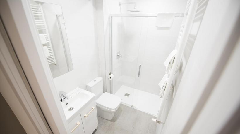 Imagen de la habitación del Hostal Happy Carrales. Foto 10