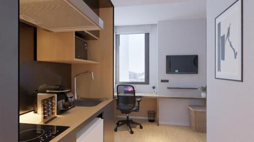 Imagen de la habitación del Hostal Home and CoLiving Pamplona. Foto 11