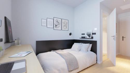 Imagen de la habitación del Hostal Home and CoLiving Pamplona. Foto 14