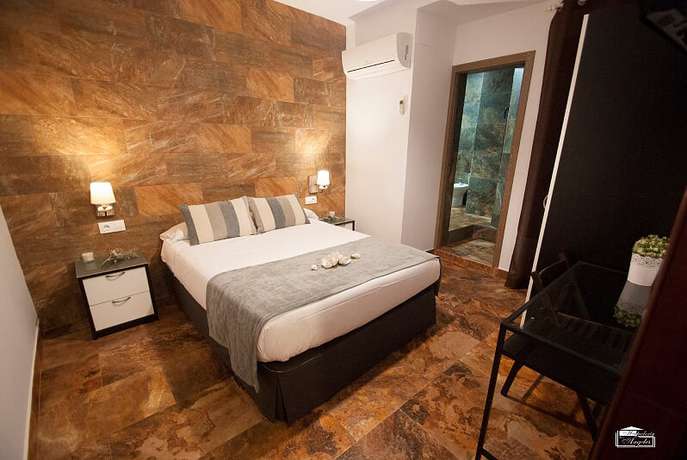 Imagen de la habitación del Hostal Hospedería Los Angeles. Foto 3