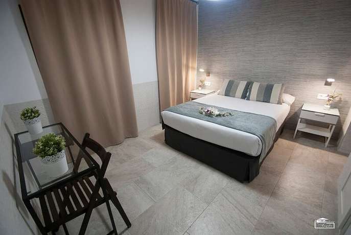 Imagen de la habitación del Hostal Hospedería Los Angeles. Foto 8