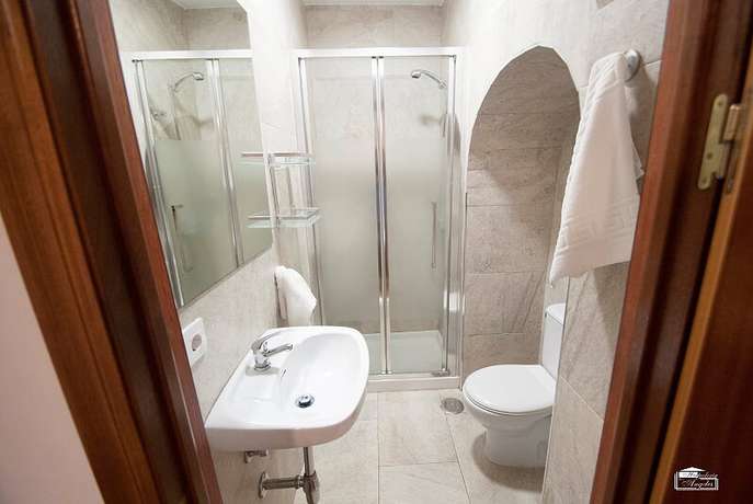 Imagen de la habitación del Hostal Hospedería Los Angeles. Foto 11