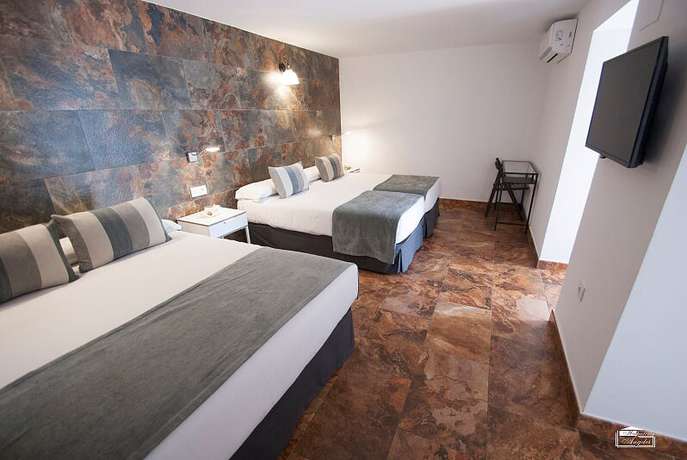 Imagen de la habitación del Hostal Hospedería Los Angeles. Foto 25