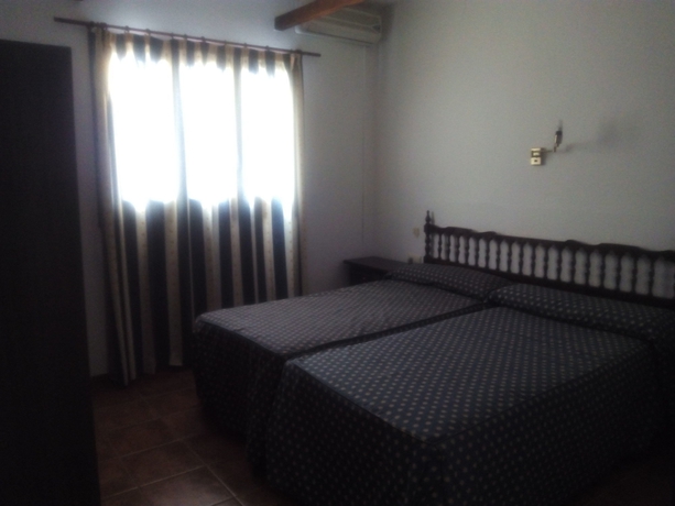 Imagen de la habitación del Hostal Hospedería Los Mellizos. Foto 10