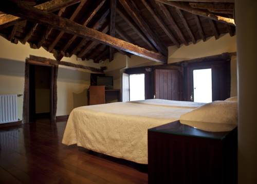 Imagen de la habitación del Hostal Hospeder&iacute;a Porta Coeli. Foto 10