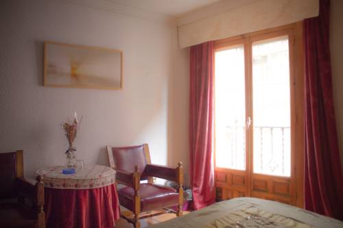Imagen de la habitación del Hostal Hostal El Cascabel. Foto 4