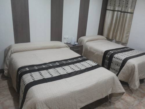 Imagen de la habitación del Hostal Hostal El Duende Blanco. Foto 6