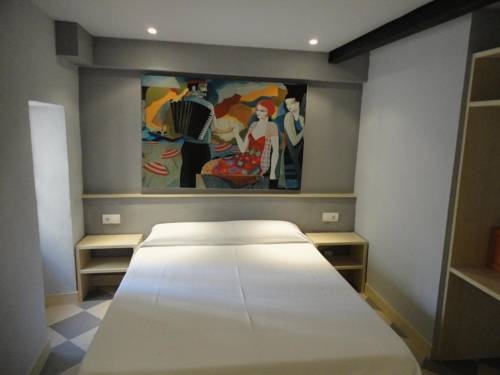 Imagen de la habitación del Hostal Hostal Los Caracoles. Foto 7