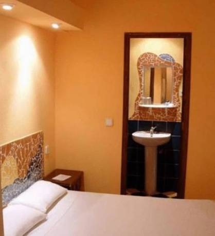 Imagen de la habitación del Hostal Hostal Los Caracoles. Foto 8