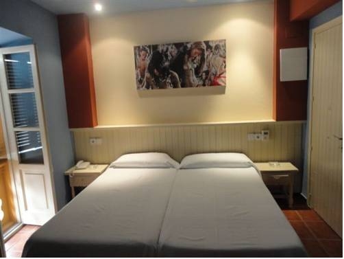 Imagen de la habitación del Hostal Hostal Los Caracoles. Foto 9