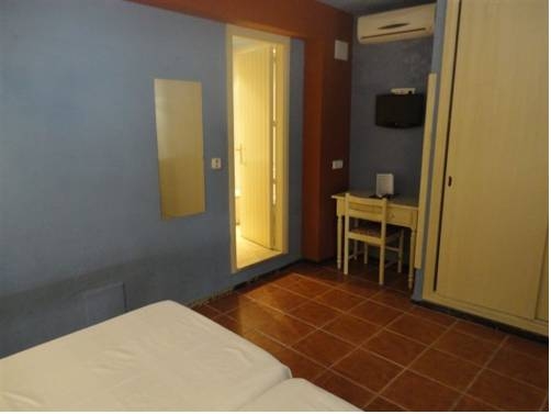 Imagen de la habitación del Hostal Hostal Los Caracoles. Foto 10