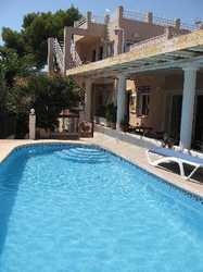 Imagen de la piscina del Hostal Hostal Residencial La Paloma II. Foto 8