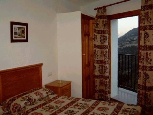 Imagen de la habitación del Hostal Hostal Rural Atalaya. Foto 13