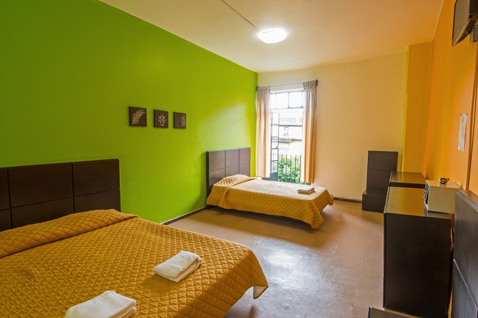 Imagen de la habitación del Hostal Hotel Amigo Suites. Foto 8