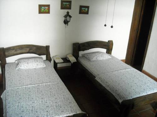 Imagen de la habitación del Hostal Hotel - Hostal Colonial Palmira. Foto 6