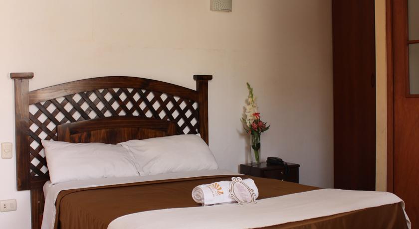 Imagen de la habitación del Hostal Hotel La Posada Del Sol. Foto 7