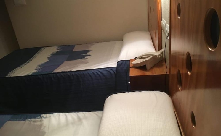 Imagen de la habitación del Hostal Hotel Quatre Llunes. Foto 8