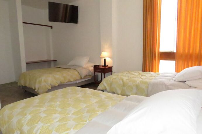 Imagen de la habitación del Hostal Huanchaco. Foto 11