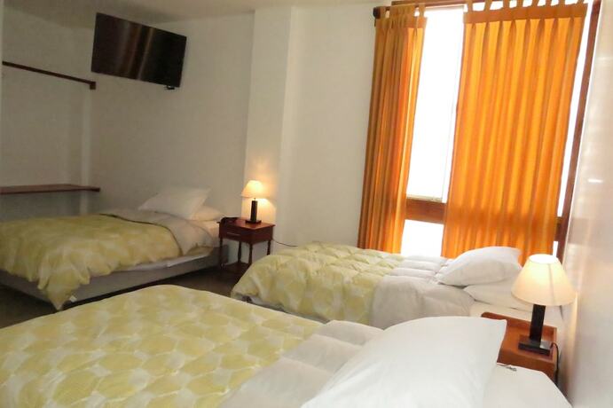 Imagen de la habitación del Hostal Huanchaco. Foto 15