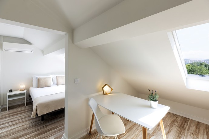 Imagen de la habitación del Hostal JR Studios and Suites. Foto 4