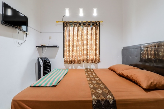 Imagen de la habitación del Hostal Java Homestay. Foto 4