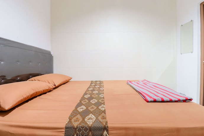 Imagen de la habitación del Hostal Java Homestay. Foto 7