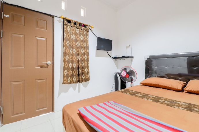 Imagen de la habitación del Hostal Java Homestay. Foto 9