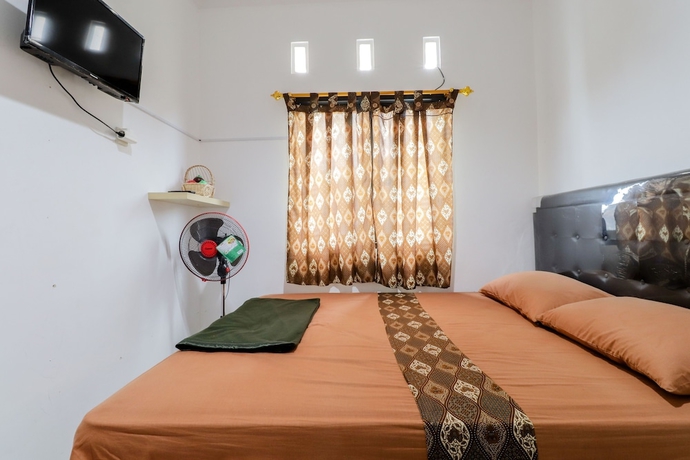 Imagen de la habitación del Hostal Java Homestay. Foto 11