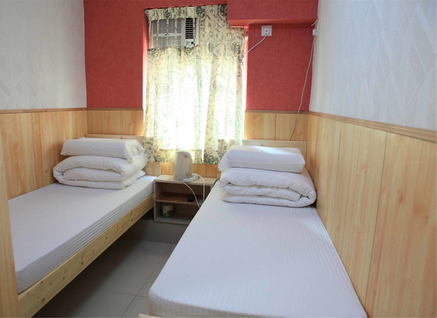 Imagen de la habitación del Hostal Kam Fu Guest House. Foto 6